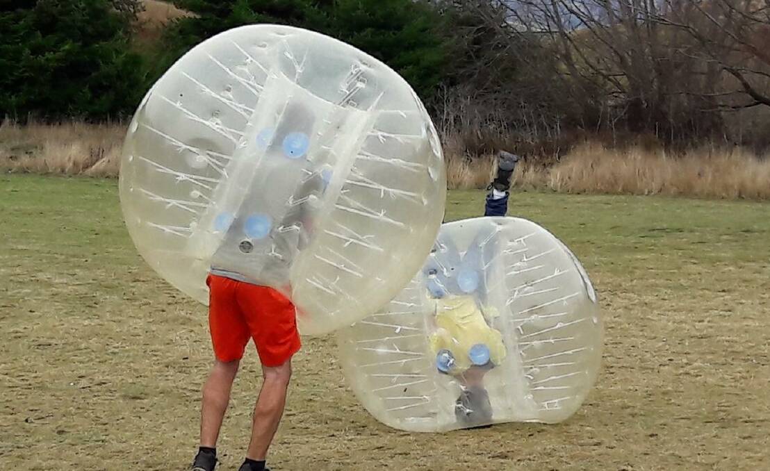 DRAMATIC PRE-ENACTMENT: Adam Weverink and Max Stainkamph pre-enacting Group 10 bubble football in New Zealand. We'll let you figure out which one is which. 