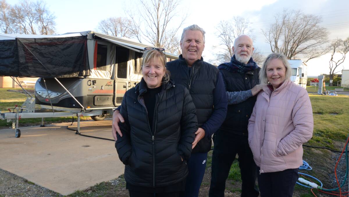 LIVING THE DREAM: Deb and David Taylor with Robyn and Stephen Hill at the Colour City Caravan Park this week. Photo: JUDE KEOGH