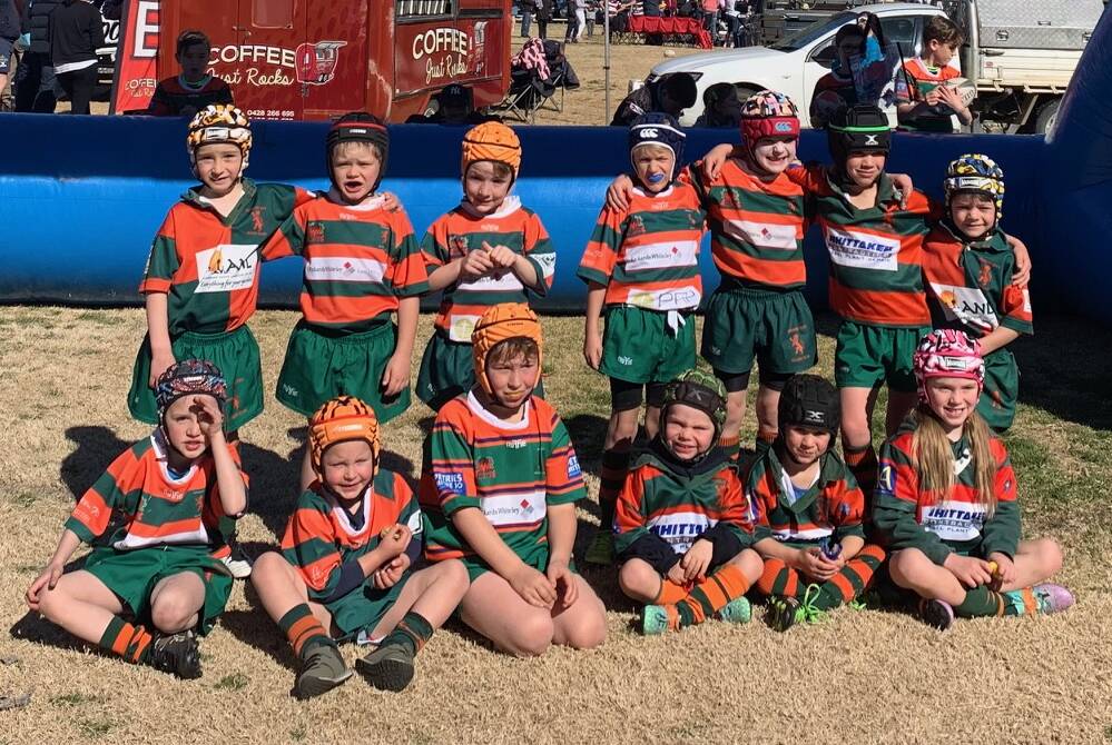 ARM IN ARM: Orange City's under-7s side in Wellington over the weekend for the final round of the junior rugby season. Photo: SUPPLIED.