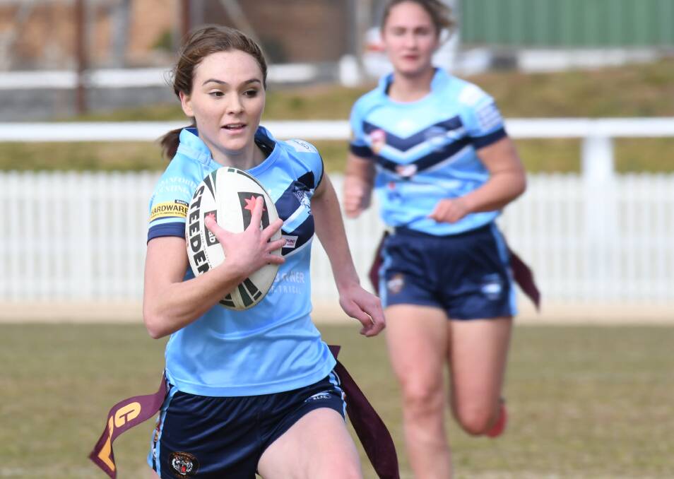 SPEEDY GONZALES: Jes Pearson off and running during CYMS and Hawks' derby at Wade Park two weeks ago. The two sides met in Bathurst in the qualifying semi-final on Saturday, where Pearson scored a hat-trick. Photo: CARLA FREEDMAN. 