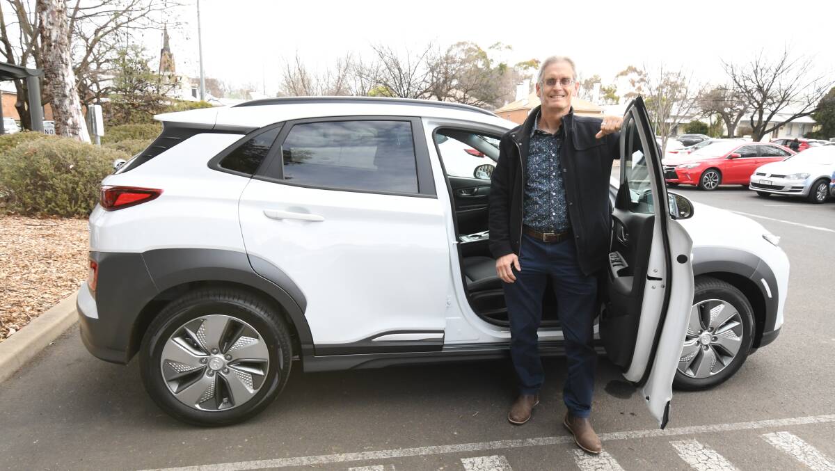 ECO FRIENDLY: Stephen Nugent with the council's new Hyundai. Photo: JUDE KEOGH