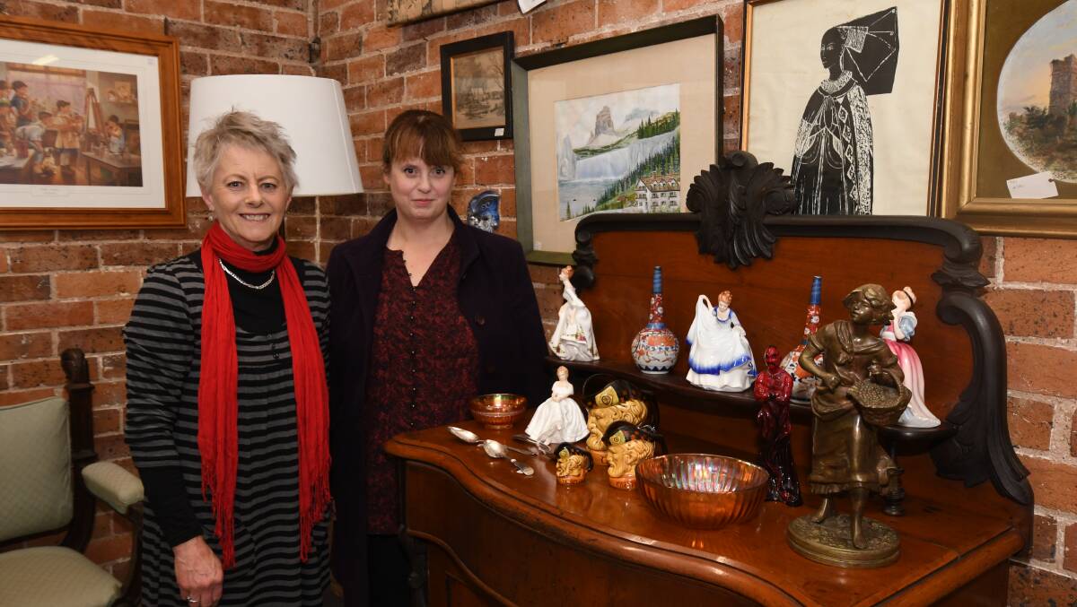 FINDING A BARGAIN: Zonta Club of Orange's Karen Blacklow and Sophie Reynolds are excited to find trinkets like these. Photo: JUDE KEOGH