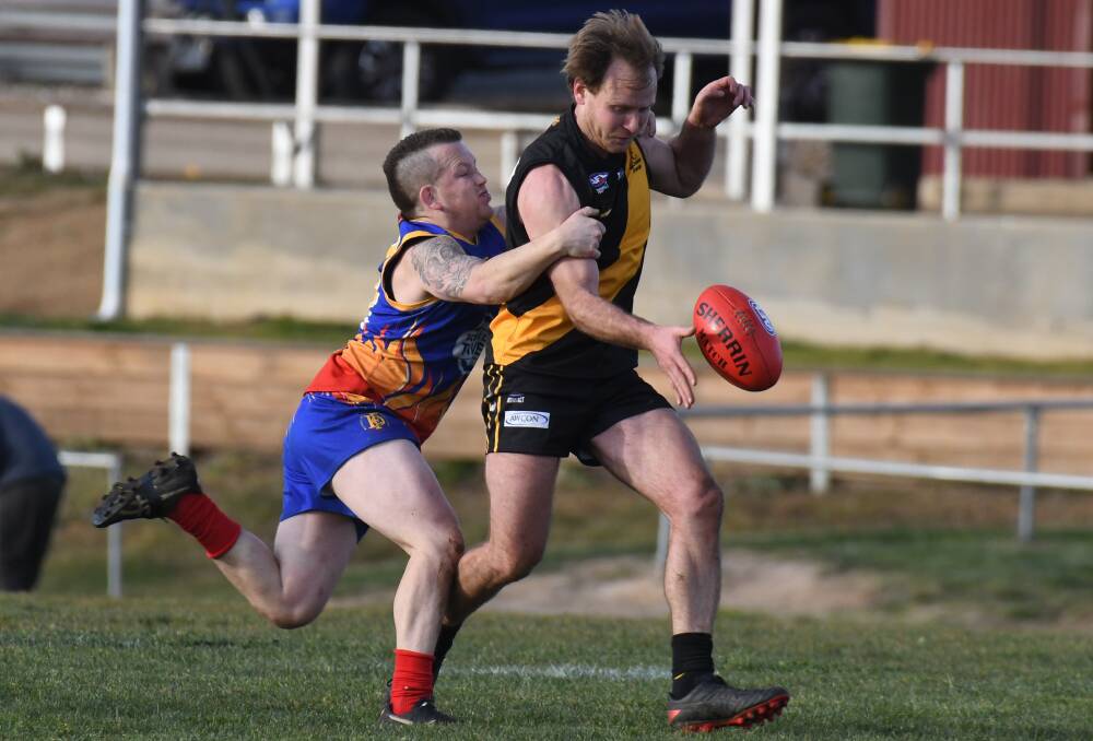 UNDER PRESSURE: Tigers midfielder Pat Taggart has been at the coalface for the yellow and black in 2020. He plays the Demons again this Saturday. Photo: JUDE KEOGH