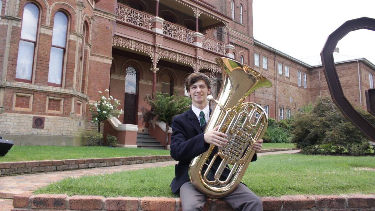 TUBA TIME: Kinross Wolaroi musician Jasper Mihalich ahead of his international tour with the Sydney Youth Orchestra. Photo: MAX STAINKAMPH