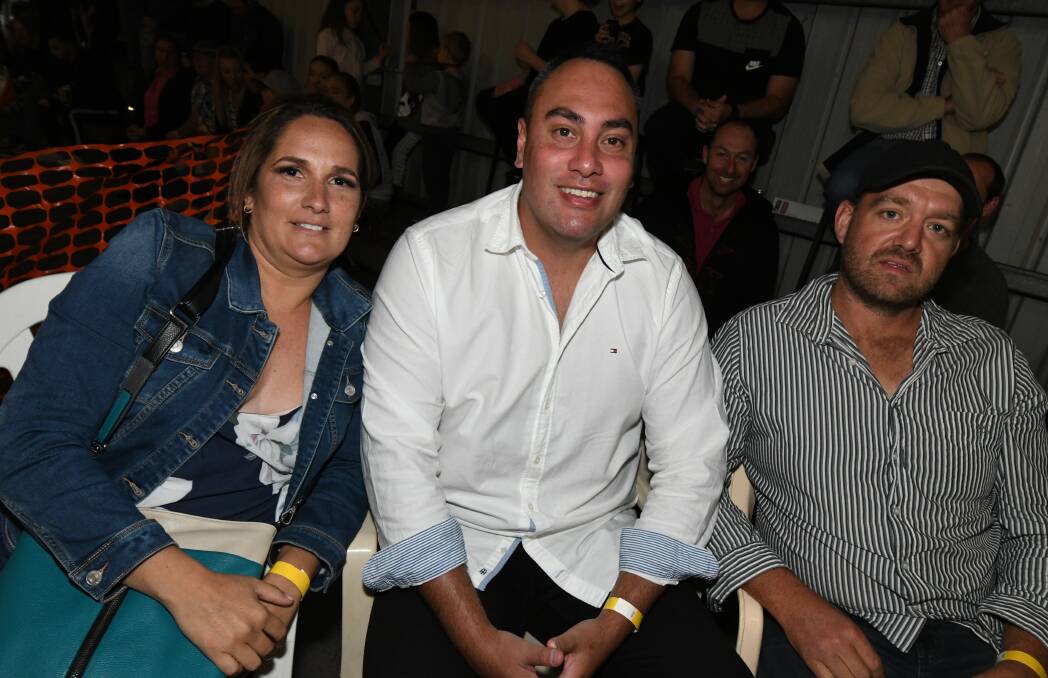 BACK IN TOWN: Viv Paasi (centre) at the Fight Night at Towac Park last month. Photo: CARLA FREEDMAN. 