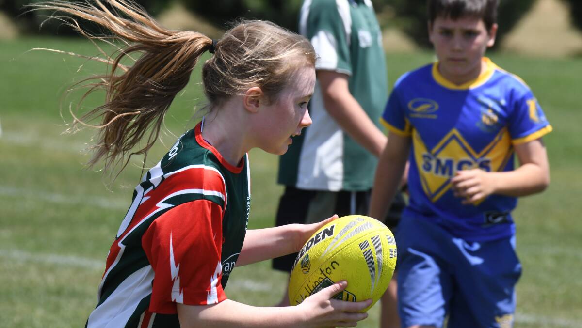 All the action from Waratahs Sportsground on Tuesday at the Western Primary School Sports Association Touch Football Carnival.. Photos: JUDE KEOGH