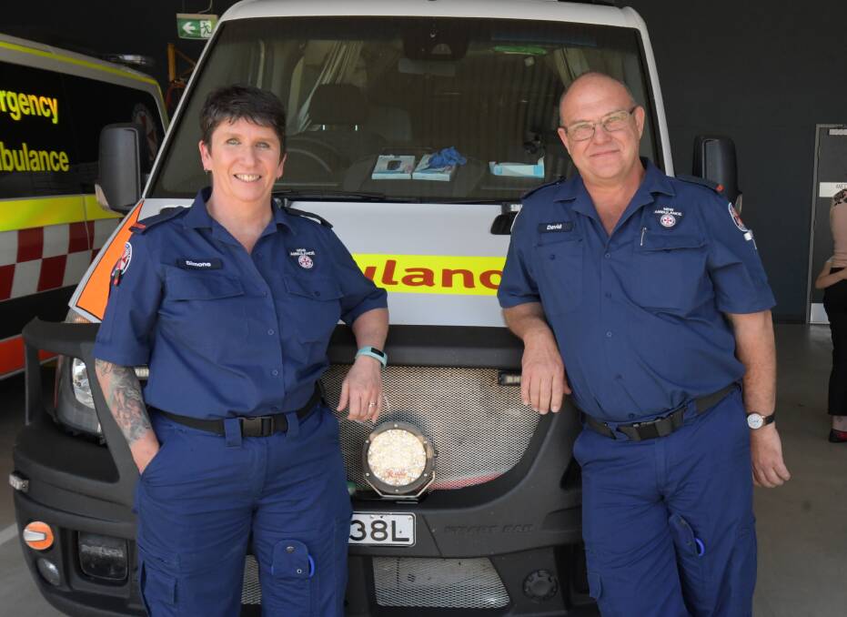 LIFE SAVERS: Volunteer ambulance officers Simone Sutherland and Dave Press. Photo: JUDE KEOGH