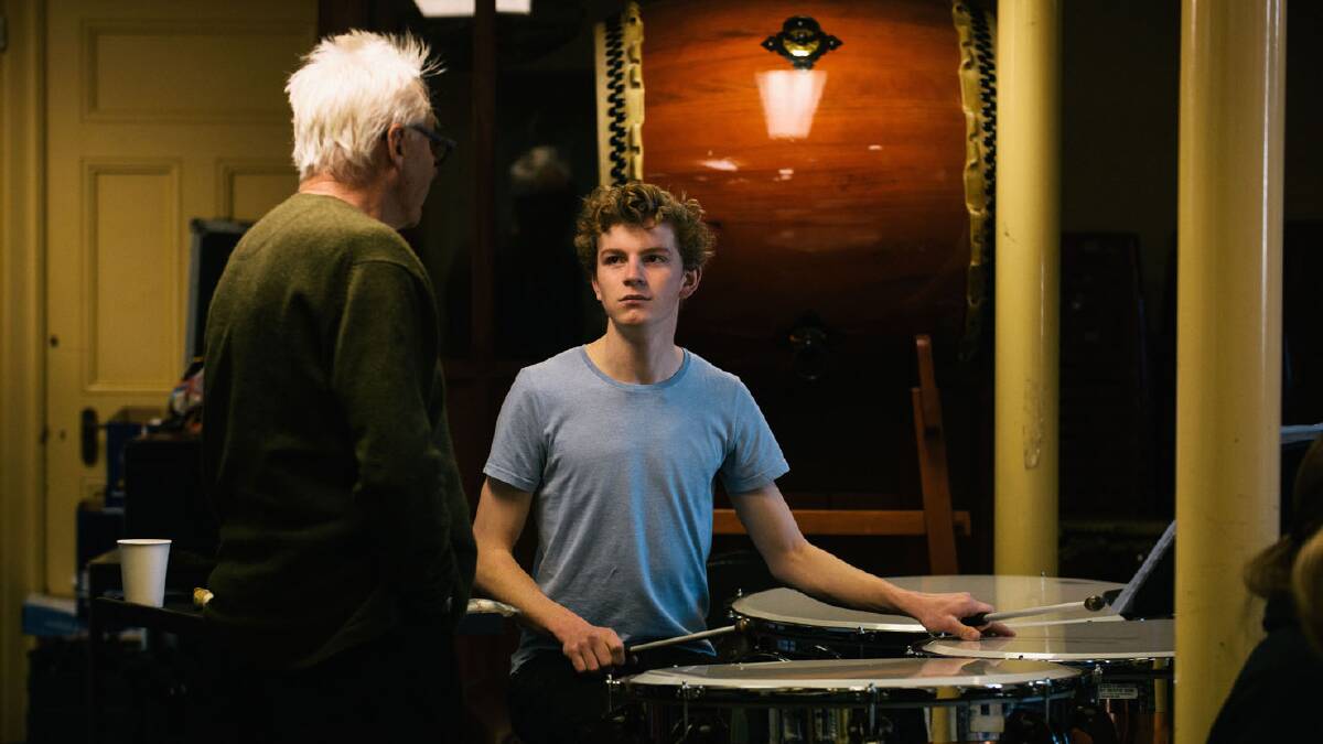 HIS OWN BEAT: Orange percussionist Owen Bloomfield with Rick Miller and the timpani before his performance last week. Photo: SUPPLIED