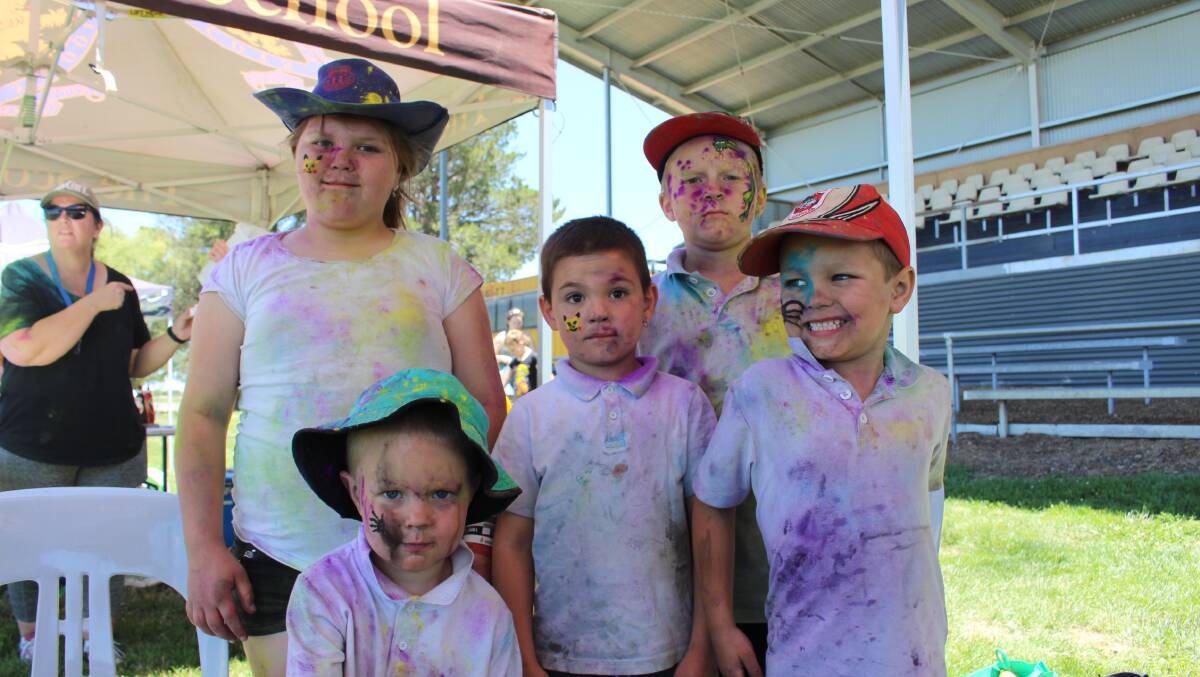  Some of the faces at the Life Without Barriers colour run on Monday  at the top field at Waratahs. Photos: MAX STAINKAMPH.