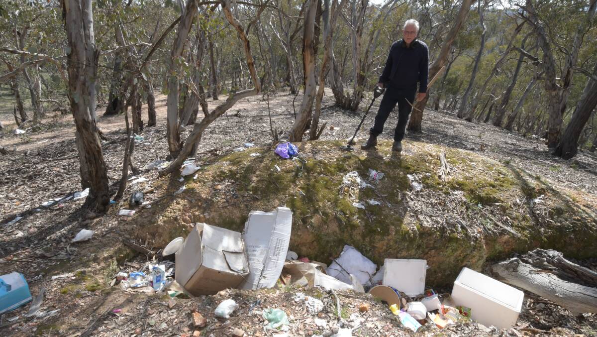 The rubbish dumped near the main campground out at Ophir. Photos: JUDE KEOGH