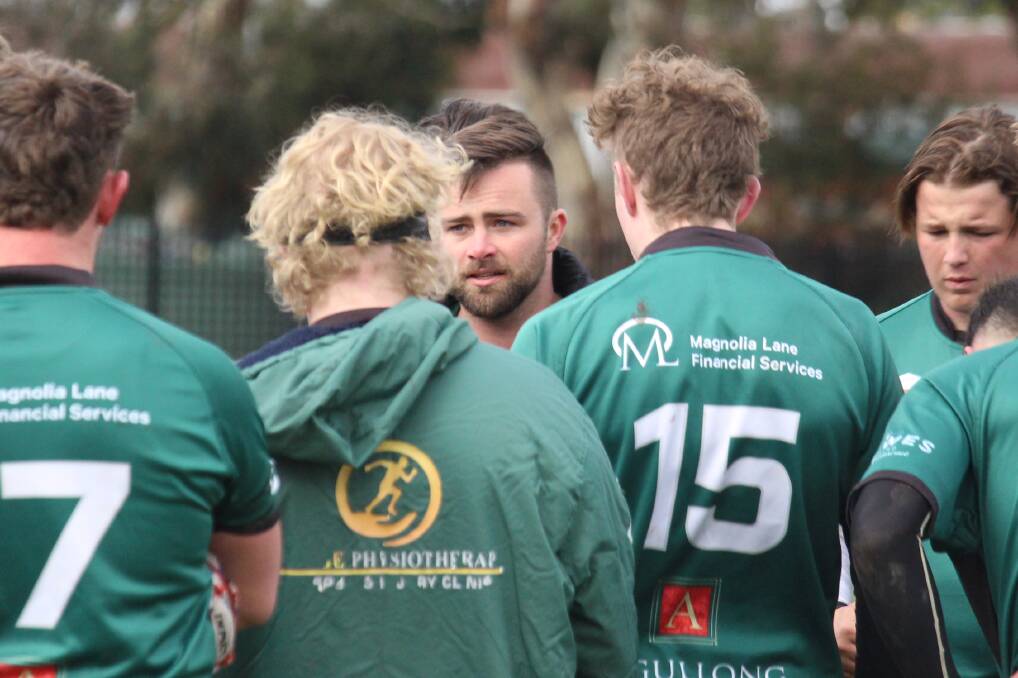 HEART RACING: Emus' colts coach Phillip Johnson addressing his troops during the main break on Saturday. Photo: MAX STAINKAMPH
