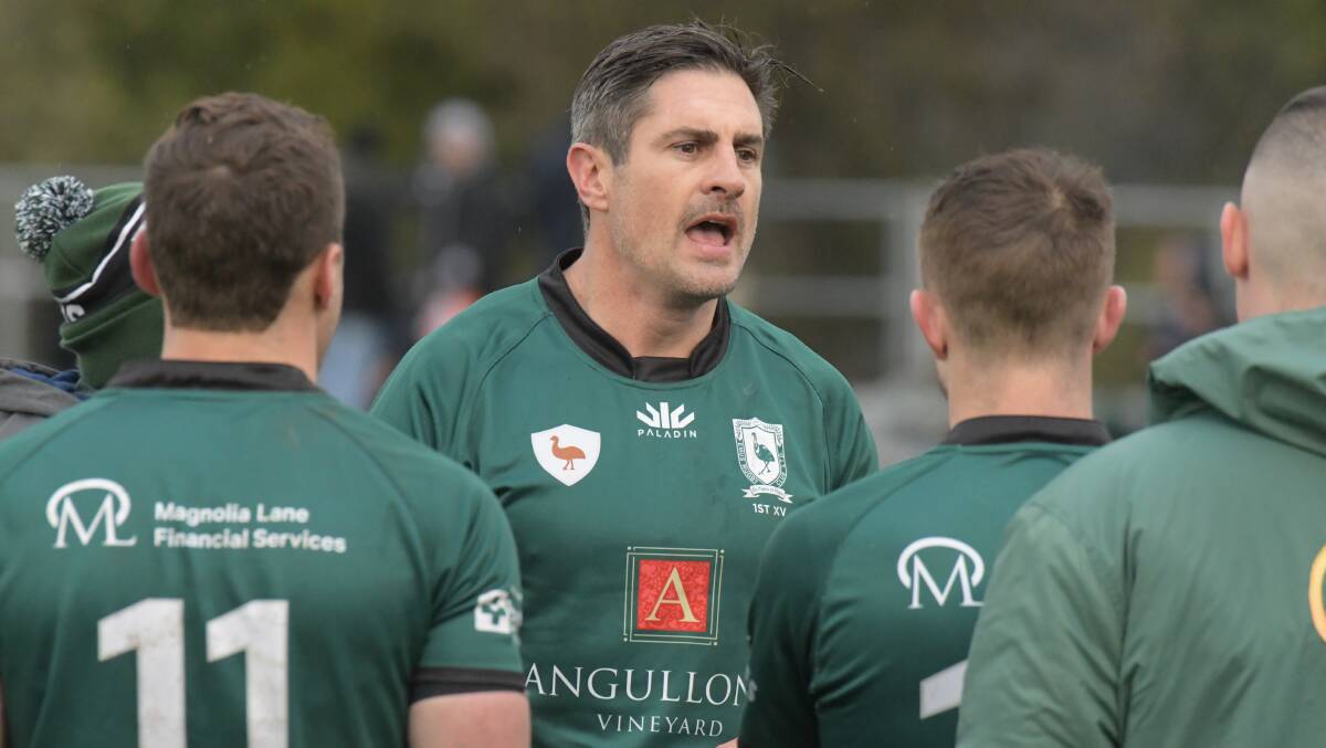 LEADER OF MEN: Orange Emus co-captain Nigel Staniforth addressing his troops during the main break of the Blowes Clothing Cup grand final. Photo: JUDE KEOGH