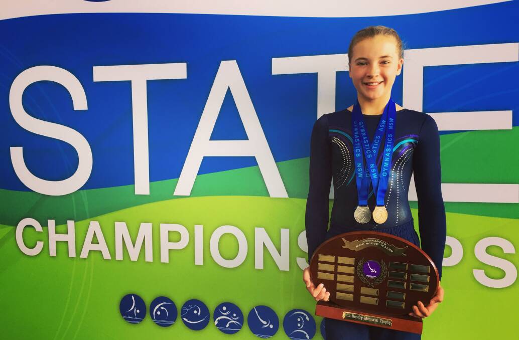 TOP PERFORMANCE: Rosie Corcoran with the John Hendry Memorial Trophy in Sydney on the weekend. Photo: SUPPLIED. 
