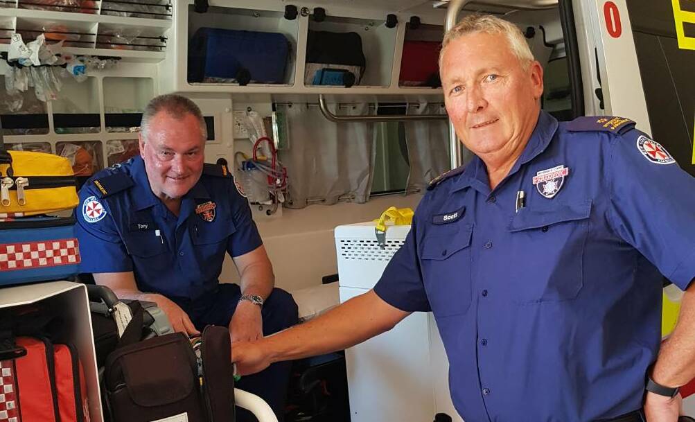 LEFT SHORT: Gilgandra paramedic Scott Beaton (right) has accused the NSW Government of playing politics over the transfer of Central West paramedics to Wagga Wagga. Photo: SUPPLIED