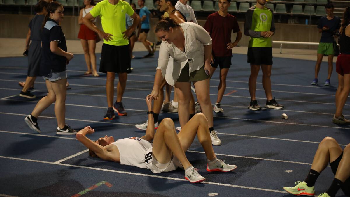 Connor Whiteley was exhausted after taking out the NSW State Championships 5000m victory. Picture by Greg Griffis/Athletics NSW. 