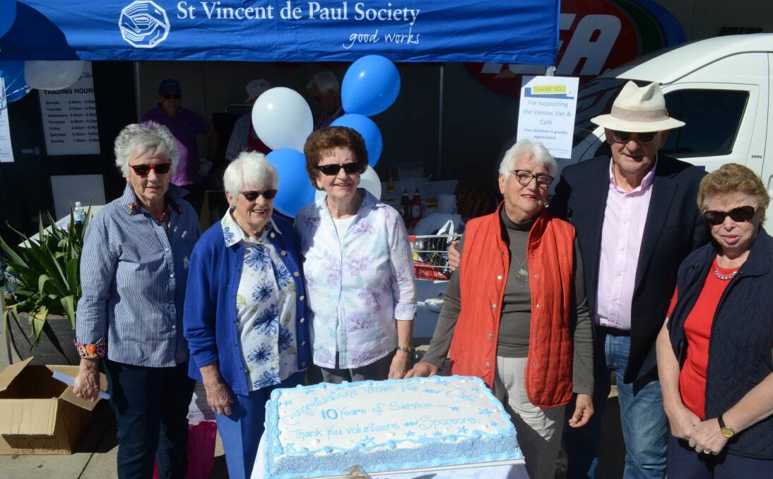 Michelle Lopez, Ruth O'Malley, Maria Mate, Monica Knight, mayor Reg Kidd and Ruth Lee come together for a special Vinnies birthday celebration in 2018. Picture supplied