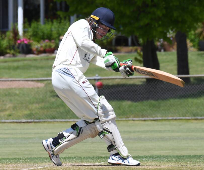 MEMORABLE MOMENT: Nick Crowley made his presence known on Saturday as he notched his maiden century in his first grade debut for Cavaliers against St Pat's Old Boys. Photo: CARLA FREEDMAN. 
