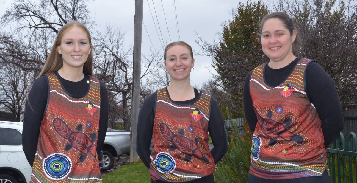 SUPPORT: Isabel Howarth, Charlotte Heath and Jade Williams will all sport Orange United's special Indigenous Round jerseys in Bathurst on Saturday. Photo: RILEY KRAUSE.