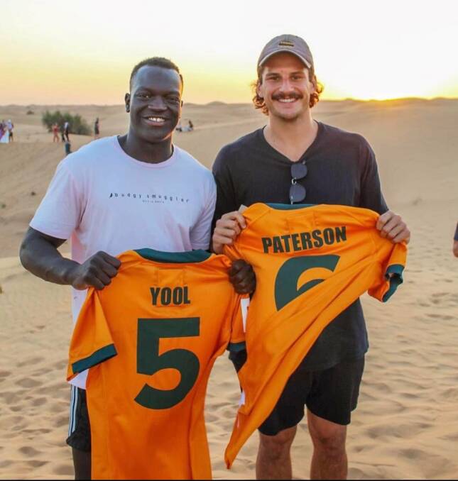 HERO TO MANY: Former Orange City junior Yool Yool and Australian teammate Henry Paterson in Dubai for the 2021 Sevens tournament. Photo: SUPPLIED.