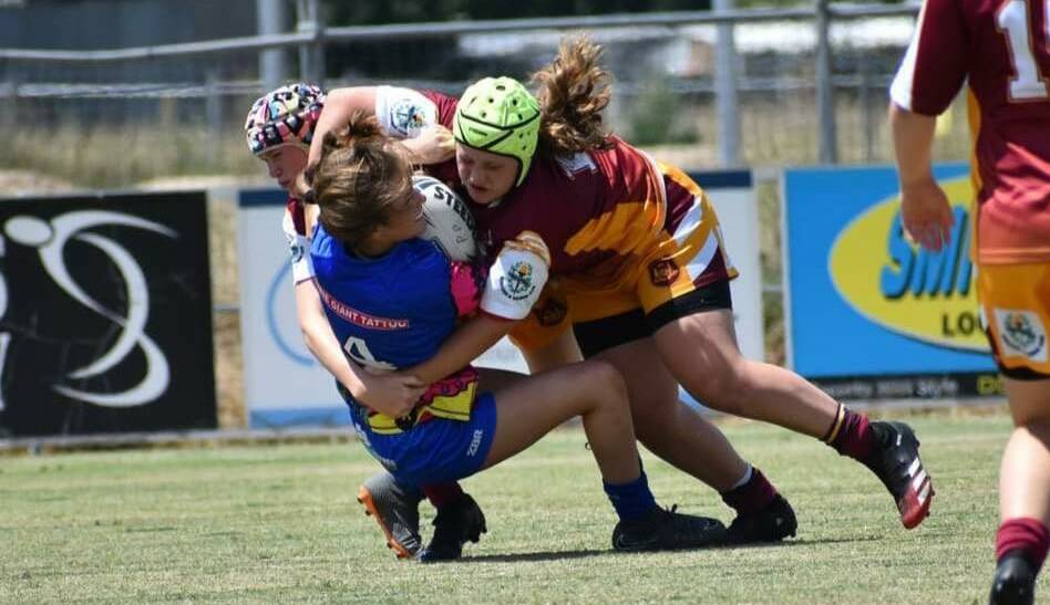 Alana O'Loughlin (green headgear) is action for Woodbridge in the Western Women's Rugby League competition. Picture supplied.