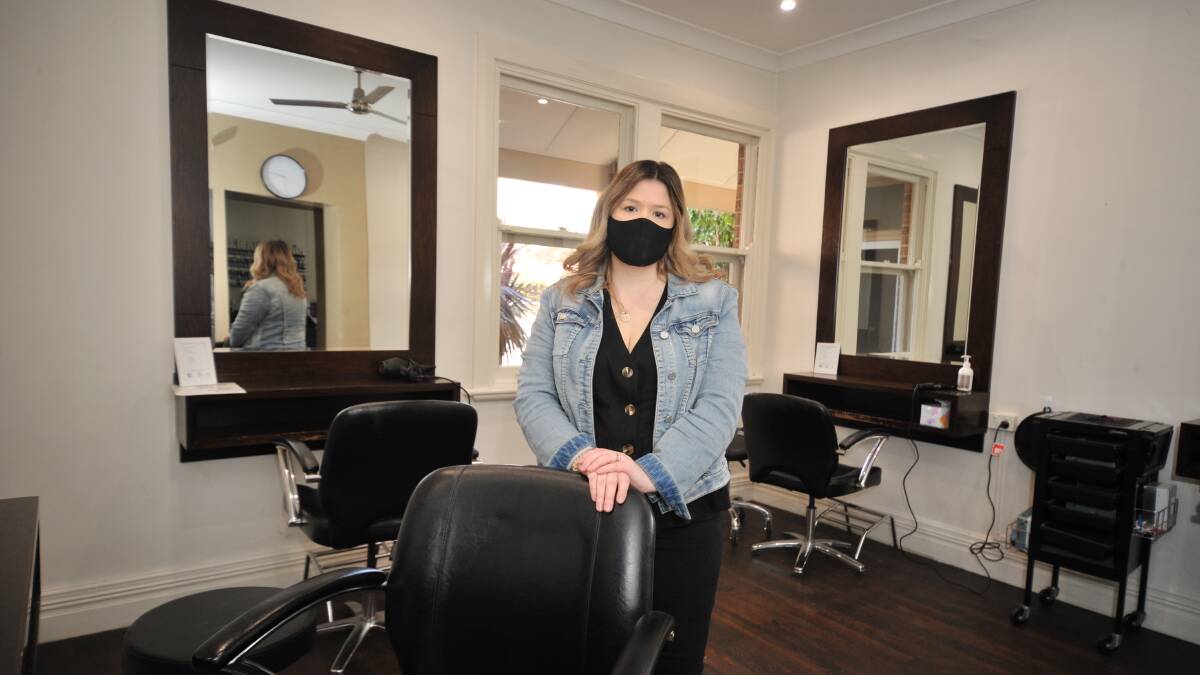 CONCERN: Teagan Wing is the owner and manager of Studio Desire Hair Design and is angry by the limit on number of clients they will be able to serve. Photo: JUDE KEOGH.