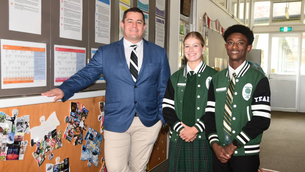 Canobolas Rural Technology High School principal Brett Blaker with students Rebecca Rhodes and Samuel Gross. Picture by Carla Freedman