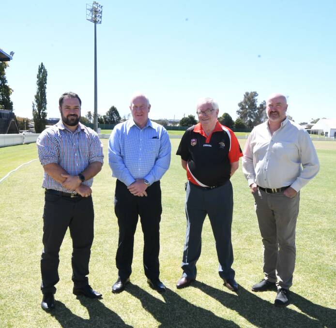 CHANGE: Evan Jones, Linore Zamparini, Bob Walsh and Dave Skinner at Wade Park on Monday to announce the change to Group 10 and 11 footy. Photo: CARLA FREEDMAN