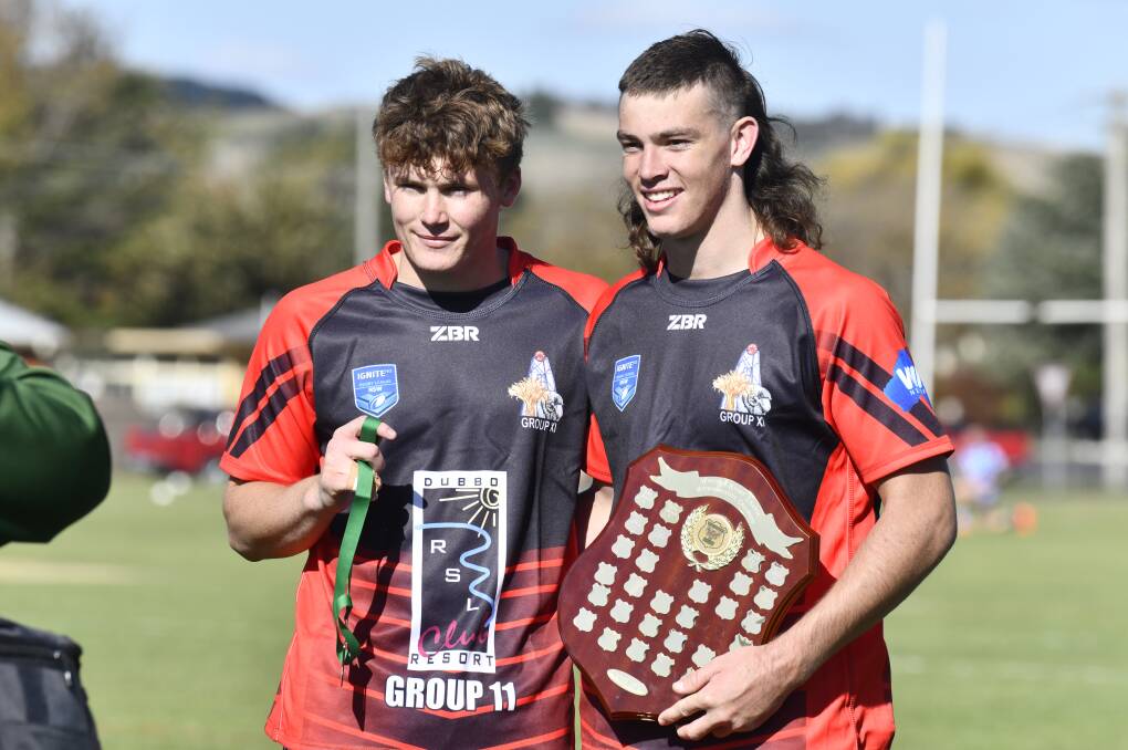 Cooper Black and Fletcher Hunt pose after Group 11 took down Group 10 in the under 18s clash. Picture by Jude Keogh.