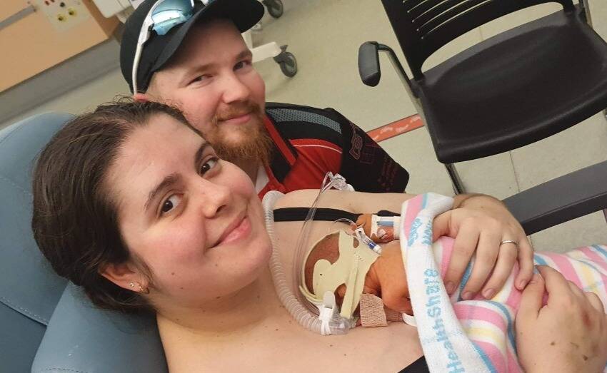 HOPEFUL: Sharni and Matt Drew holding baby Jayce just days after he was born at just 26 weeks. Photo: SUPPLIED.