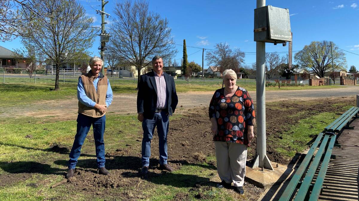 NEW LIGHTS: Peter Batten, Cabonne Shire mayor Kevin Beatty and Molong Magpies Rugby Union Club president Mary Mulhall at The Rec.