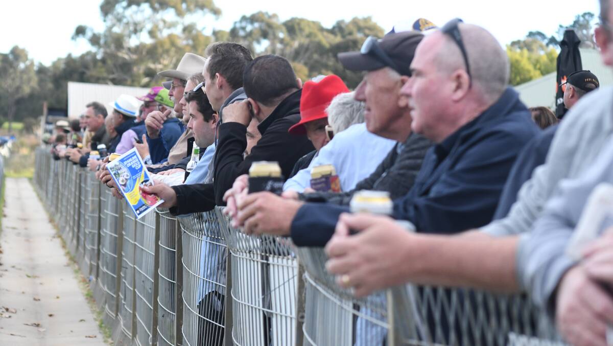 ANTICIPATION: Punters were lining up on Friday afternoon to get a good look at all the Gold Cup action. Photo: JUDE KEOGH