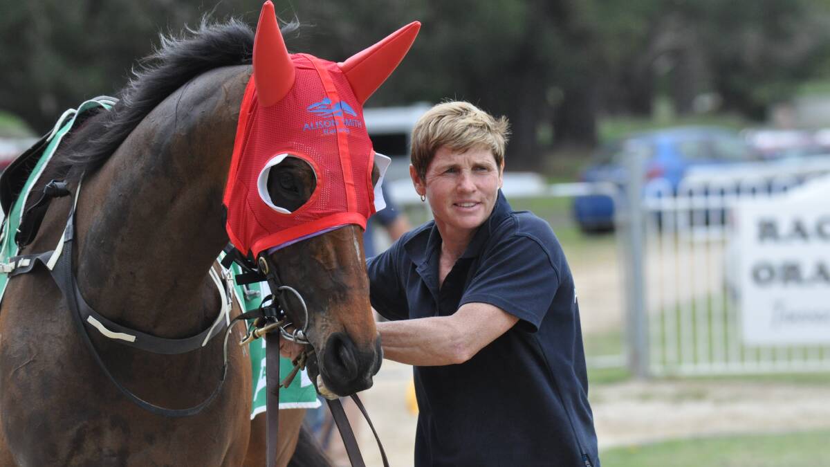 WHAT A WIN: Alison Smith and Who's Tinny were victorious in the opening race at Towac Park on Friday.