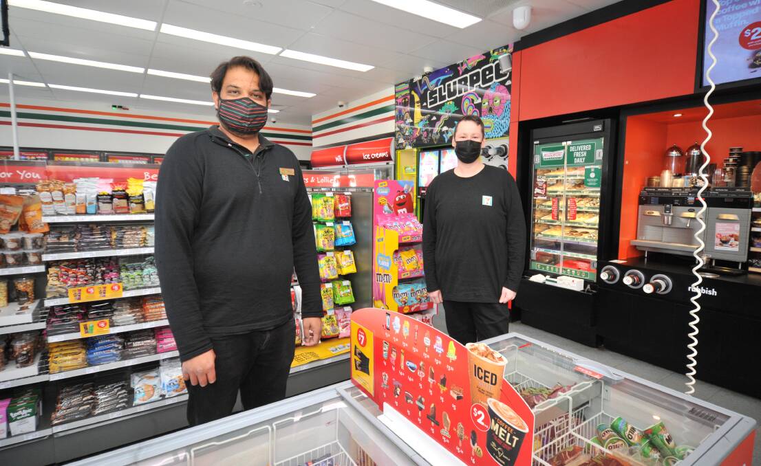 OPEN: Shaunak Muzumdar and Clinton Beale are pleased to be back at work after the Bathurst Road store was shut due to COVID precautions. Photo: JUDE KEOGH.