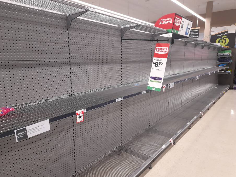 GONE BABY GONE: The toilet section paper of the Woolworths in Anson Street was empty as of 2.30pm on Monday. Photo: RILEY KRAUSE.