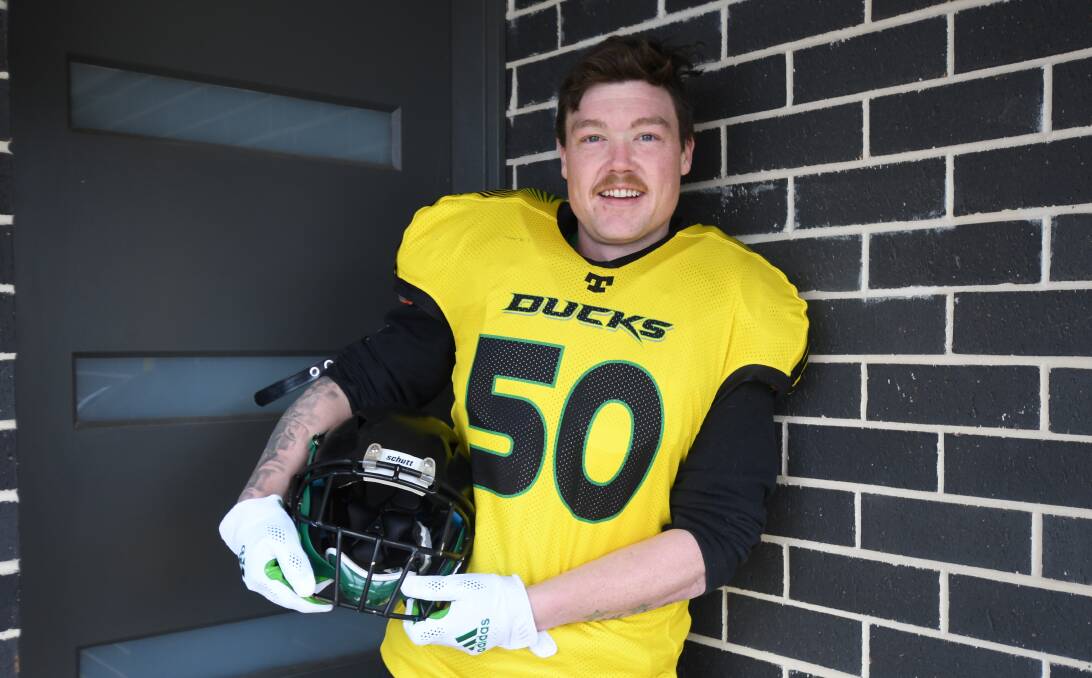 HUDDLE UP: Ian McGregor plays for the Nepean Ducks in the Gridiron NSW Competition and will be stepping it up a notch when he represents his home state. Photo: JUDE KEOGH.