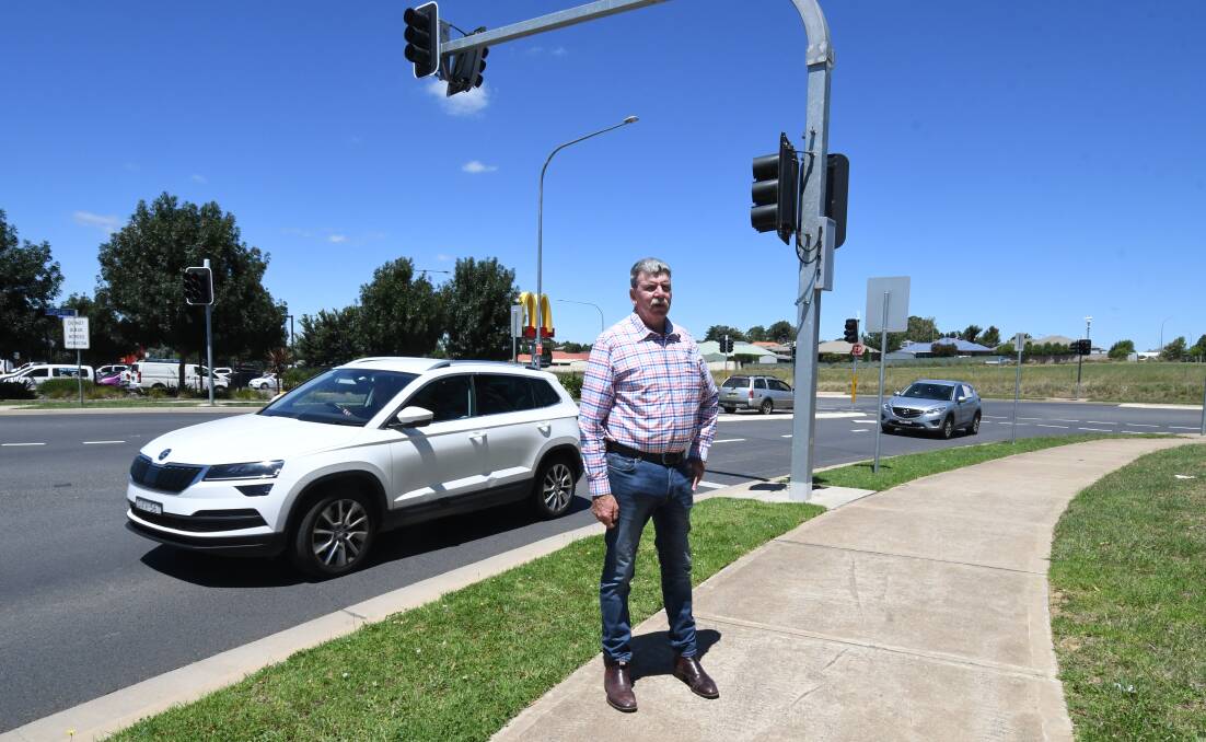 EASY TRAFFIC: Councillor Glenn Taylor wants the traffic lights at the corner of Telopea Way and the Northern Distributor turned into a roundabout. Photo: CARLA FREEDMAN.