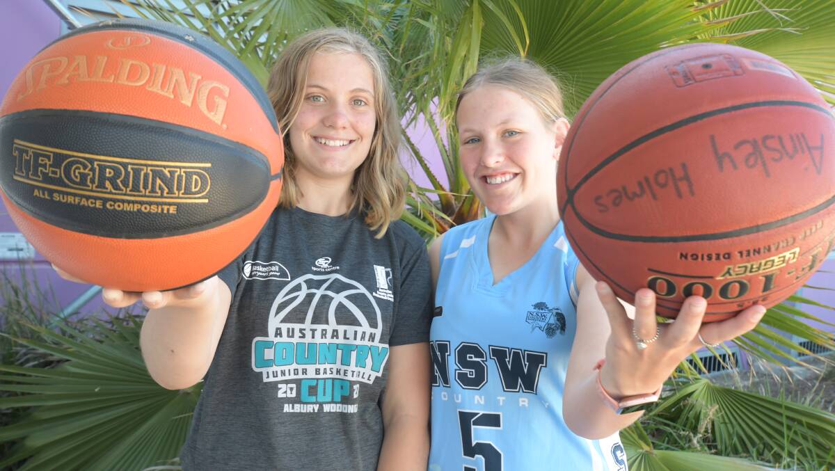 SHARP SHOOTING: Keeley and Ainsley Holmes are ready to take on the best in the state. Photo: JUDE KEOGH