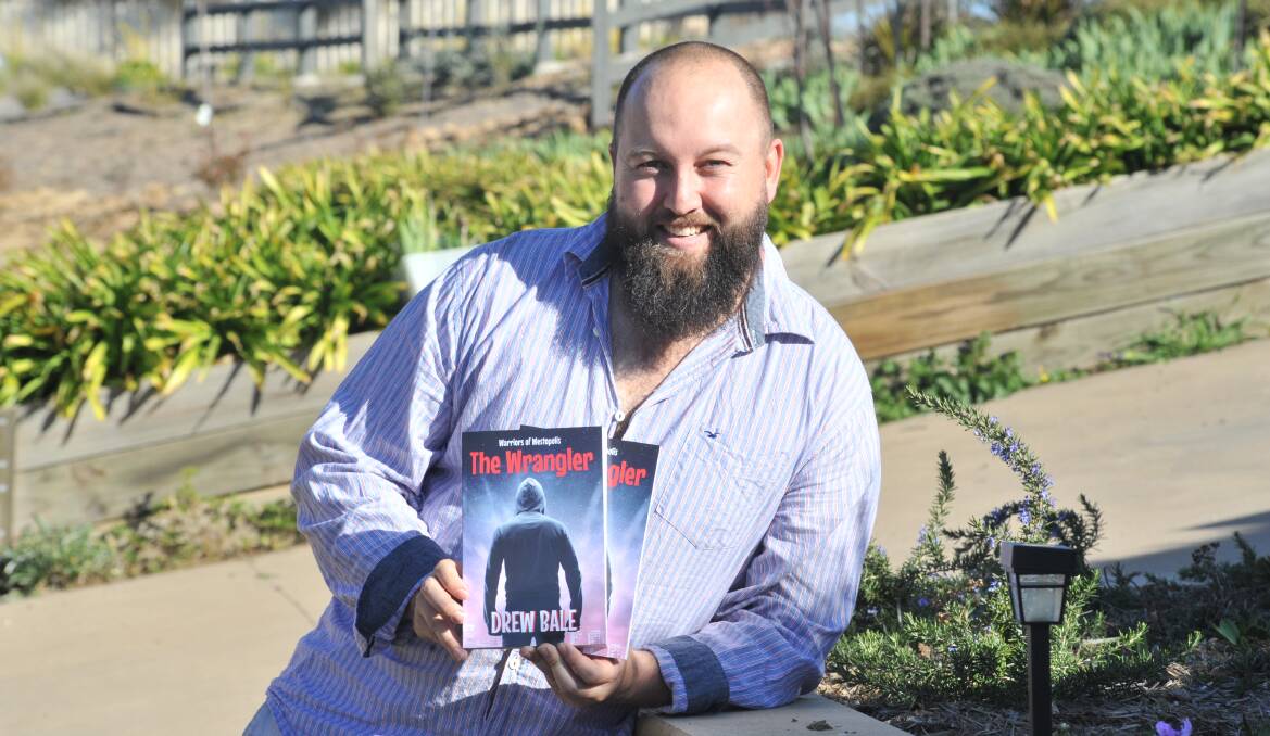 KICKING GOALS: Orange author Drew Bale has published his third book - The Wrangler - and is hoping the region gets behind its publication. Photo: JUDE KEOGH. 