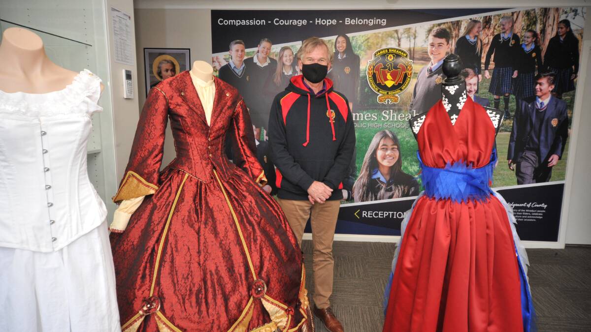 EDUCATION UPDATE: James Sheahan Catholic High School principal Peter Meers with some of the year 12 textile students projects. Photo: JUDE KEOGH 