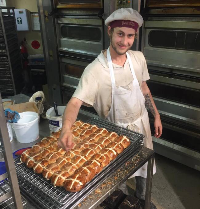 DELICIOUS: Morgan Thomas from Bakers Delight was busy at work over the weekend. Photo: RILEY KRAUSE.