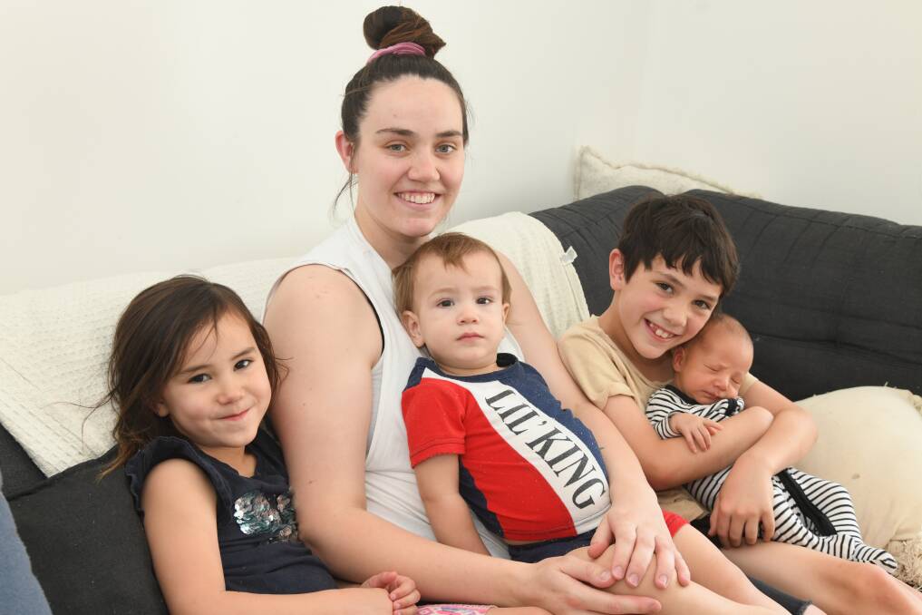 Honor, Zion, Lushion and Reign Kingi with their mum Amy Bradley. Picture by Jude Keogh