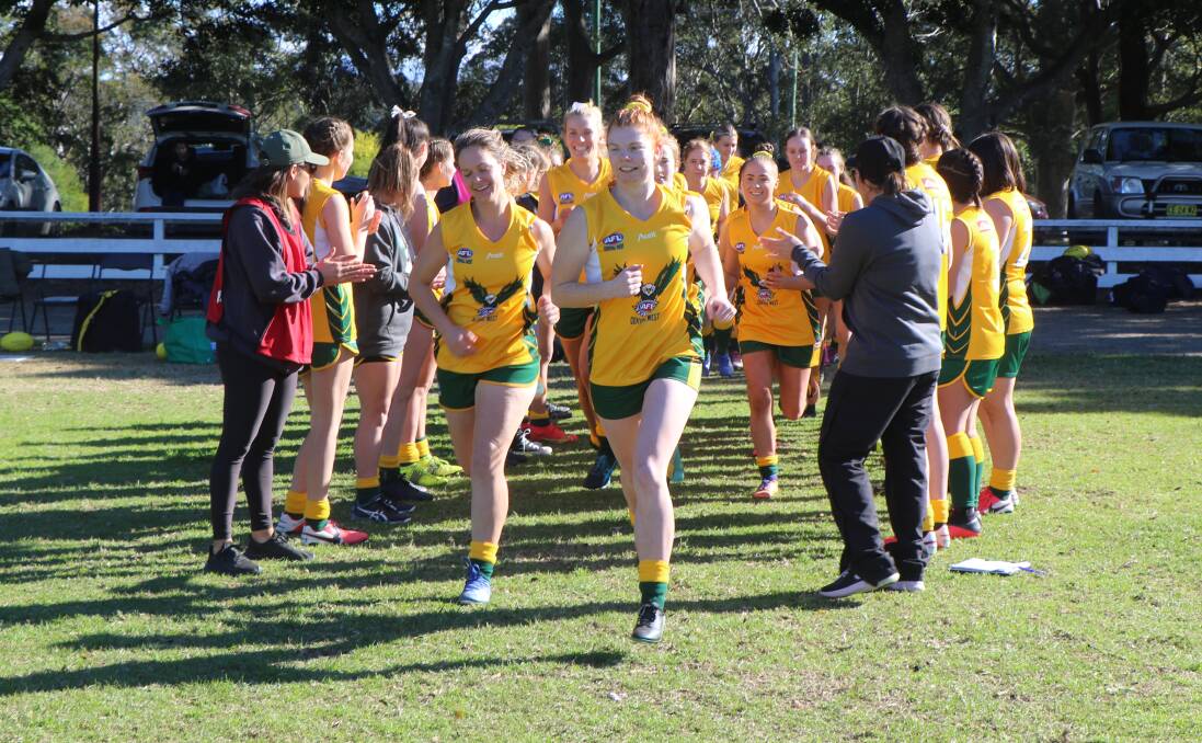 WELL DONE: The AFL Central West Eagles women's side running onto the park for their clash with the Sapphire Coast. Photos: BEN NEELY, AFL CENTRAL WEST MEDIA 