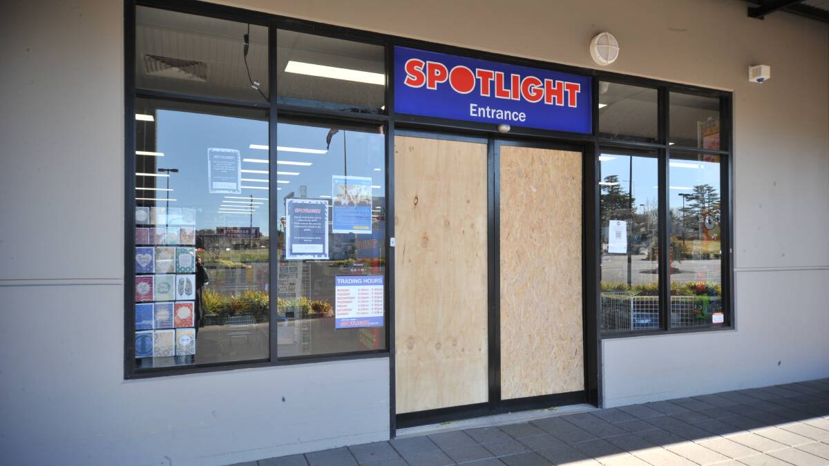 INVESTIGATION: The entrance of Orange Spotlight which was ram-raided early Thursday morning has been boarded up until it can be properly fixed. Photo: JUDE KEOGH.