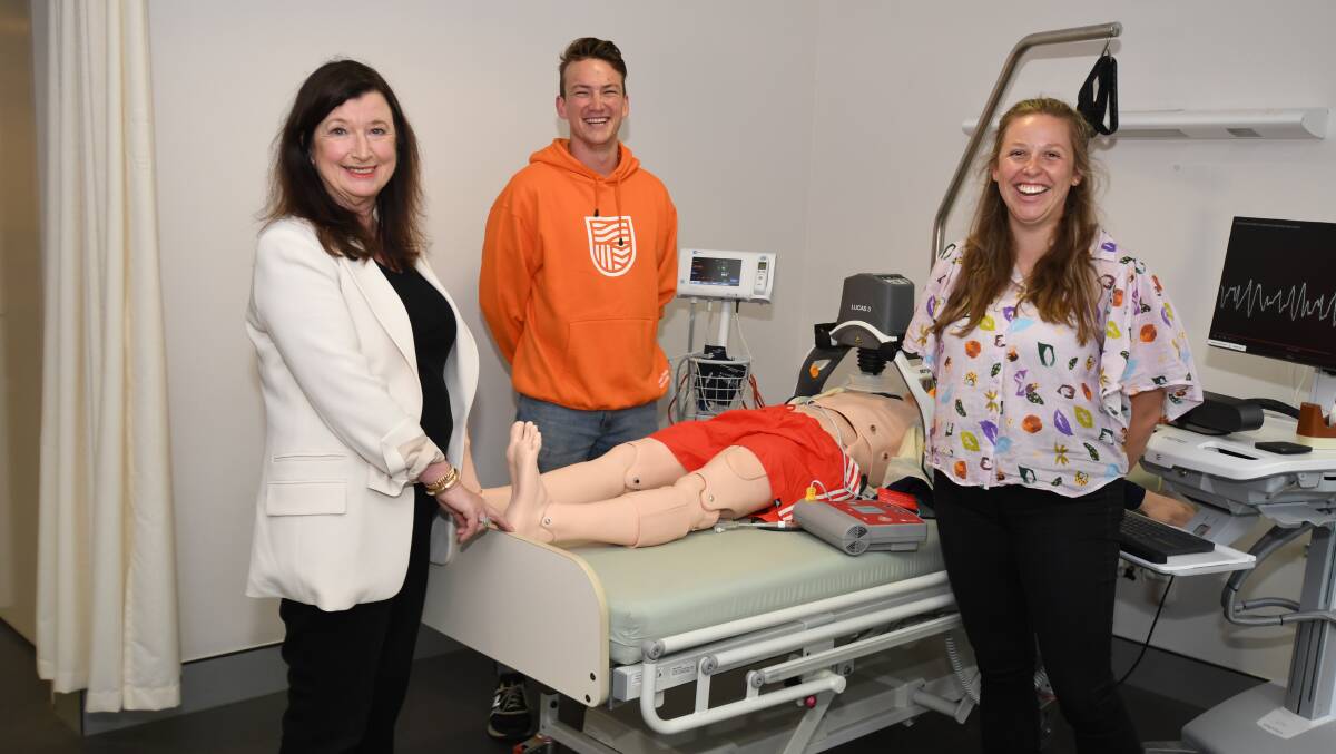 NEW BEGINNINGS: Professor Lesley Forster with CSU medical students James Croke and Sophie Matthews. Photo: JUDE KEOGH.