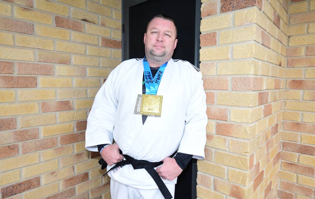 BRILLIANT WORK: Tim Denzel received his black belt in judo in July, a decade after he began his martial arts journey. Photo: CARLA FREEDMAN.
