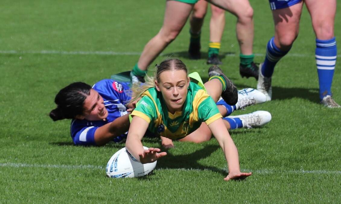 WINNERS: Hope Gibson goes over for a try in CYMS' upset victory over St Pat's. Photo: PETESIB'S PHOTOGRAPHY.