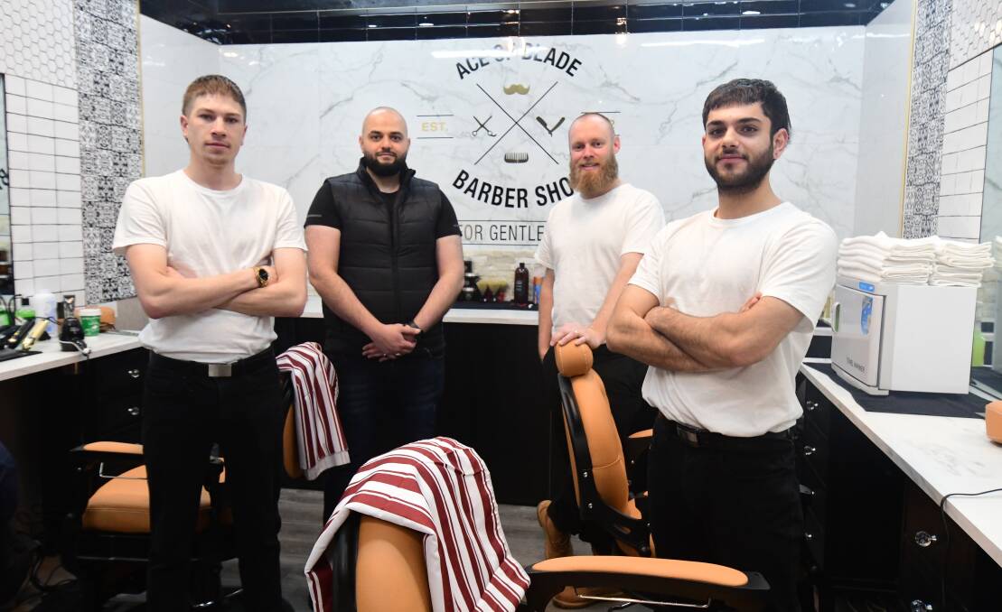 WELCOME: Eric Stewart, Rami Palo, Pat Hodgson, Zein "Ace" Jarallah from Ace of Blade, the new barbershop in Orange. Photo: JUDE KEOGH.