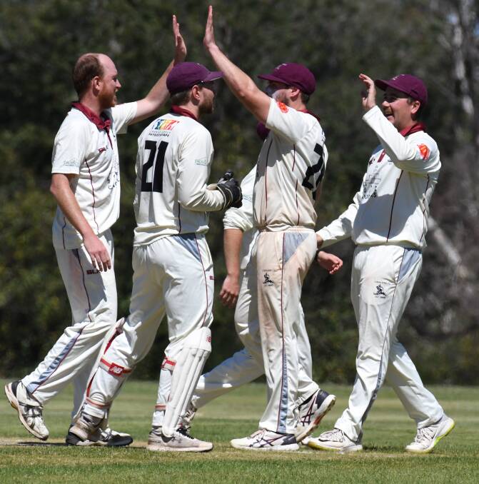 WINNERS ARE GRINNERS: Cavaliers had a day to remember with the ball as they skittled Orange City for 95, to book their place in the finals. Photo: JUDE KEOGH.