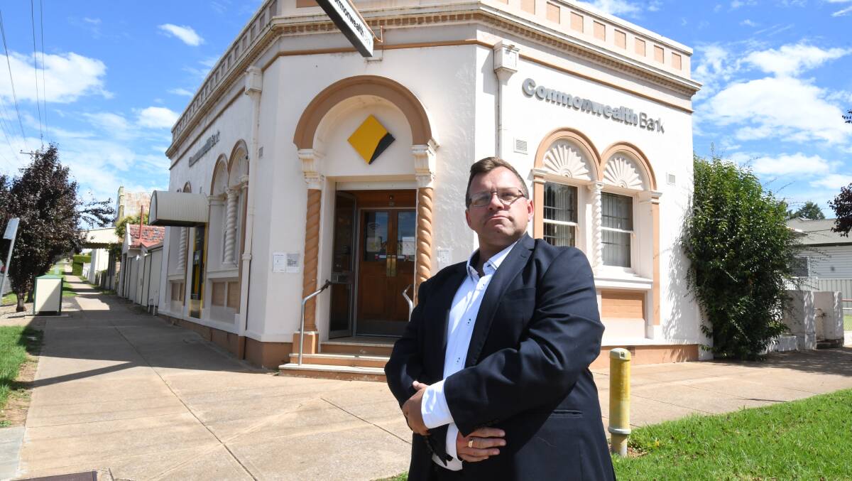 FINAL DECISION: Molong resident Aaron Pearson created a petition against the closure of the Commonwealth Bank which received more than 1,000 signatures. PHOTO: JUDE KEOGH 
