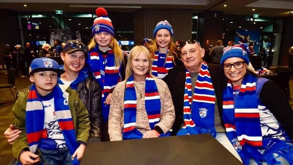 CHEERING: Boyd Hunter, Dale Hunter, Sienna Hunter, Linda Doevendans, Charli Hunter, Paul Edwards and Kristen Hunter at the MCG in 2020 for a match between the Western Bulldogs and the Melbourne Demons.
